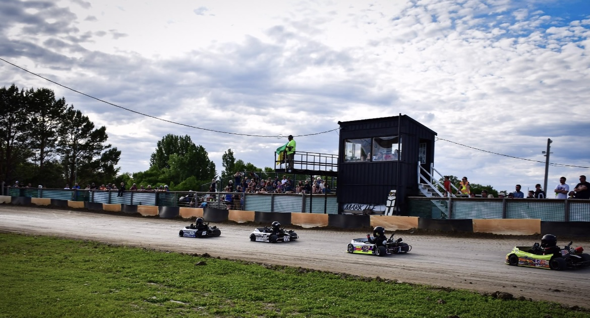 children in go karts at start line